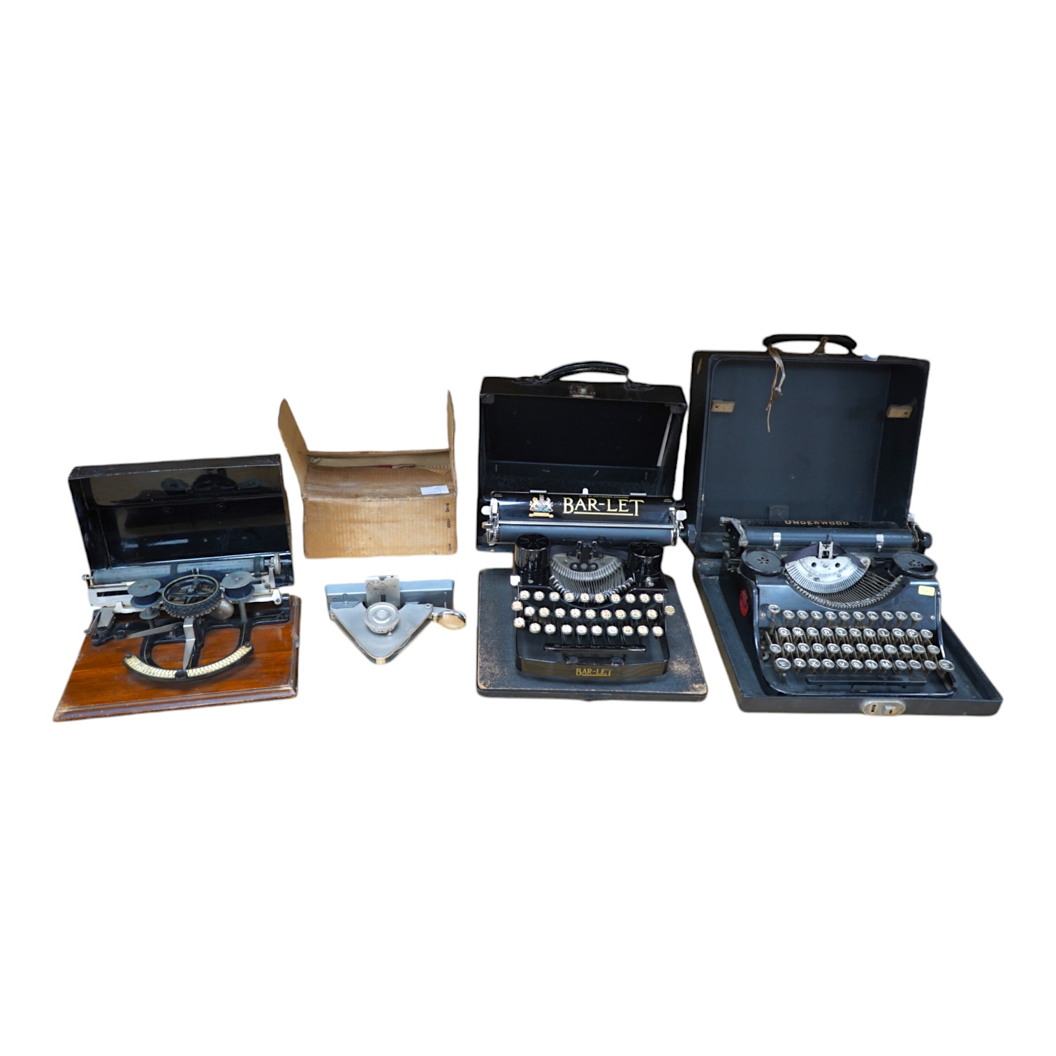 A Peoples Champion Indexing Typewriter, circa 1893, by the Garvin Machine Co., New York, on a mahogany plinth, with black tin cover, inscribed ‘’PEX’’ CHAMPION, width 28cm; a Bar-Let vintage typewriter, cased; an Underwo